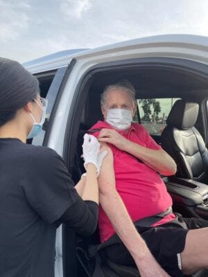 Brian Wilson gets a Covid jab