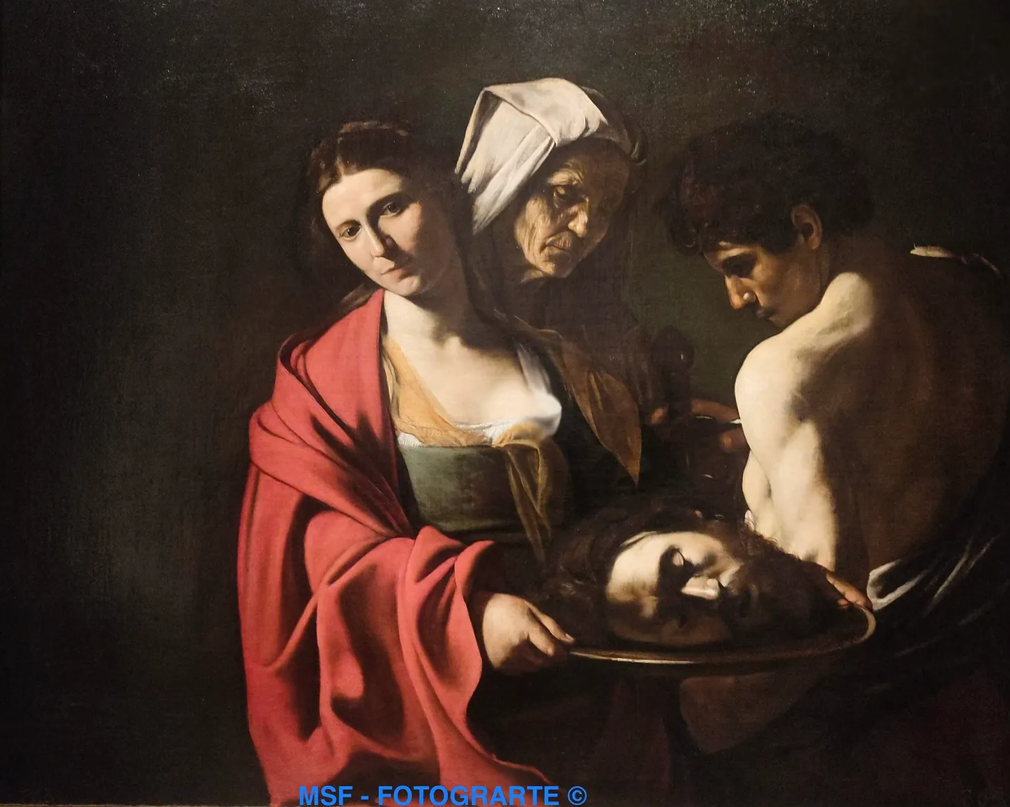 Salomé cabeza Juan Bautista (Caravaggio, GCR)