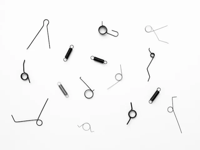 Pins over a white background by Dan Cristian Paduret from Unsplash