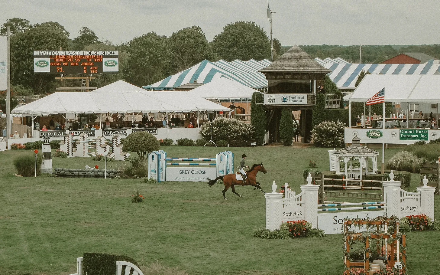 Hamptons grass show jumping course with grand prix stands