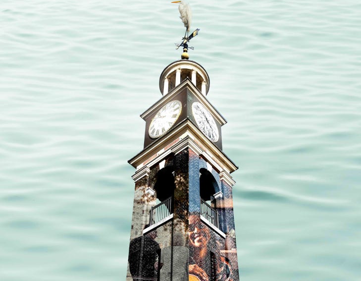 A clock tower with images projected onto it