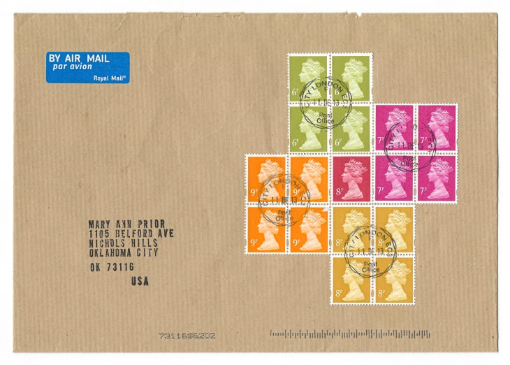 A brown envelope addressed to an address in Oklahoma, with 15 British stamps used