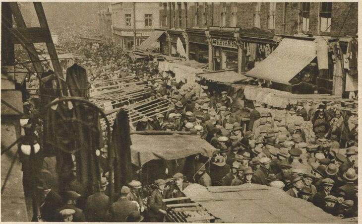 Petticoat Lane in the early 20th century. It looks a bit crowded.