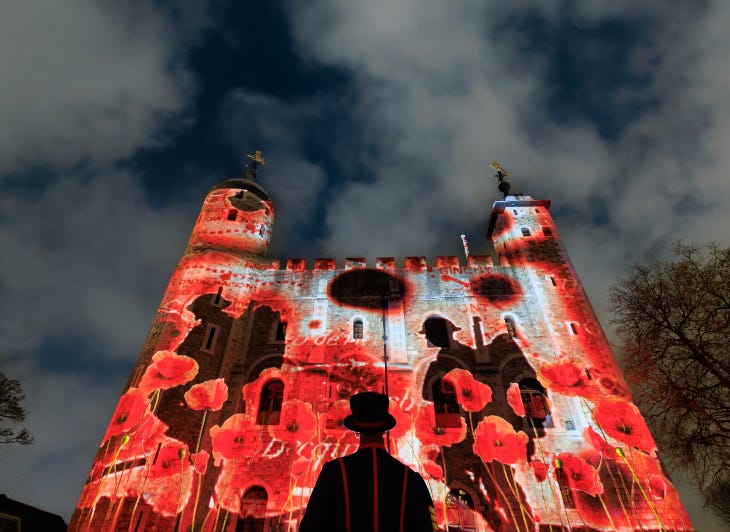 Images of poppies and soldiers projected onto the Tower of London at night