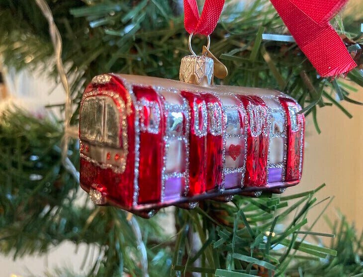A christmas bauble shaped like a tube train