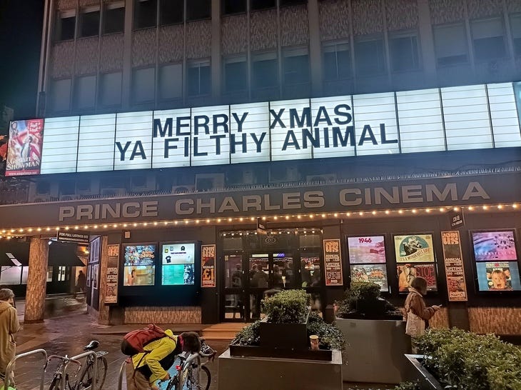 A cinema marquee: Merry Xmas ya Filthy Animal