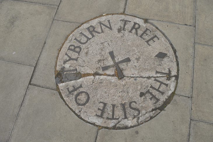 A plaque on the floor marking the site of the Tyburn Tree