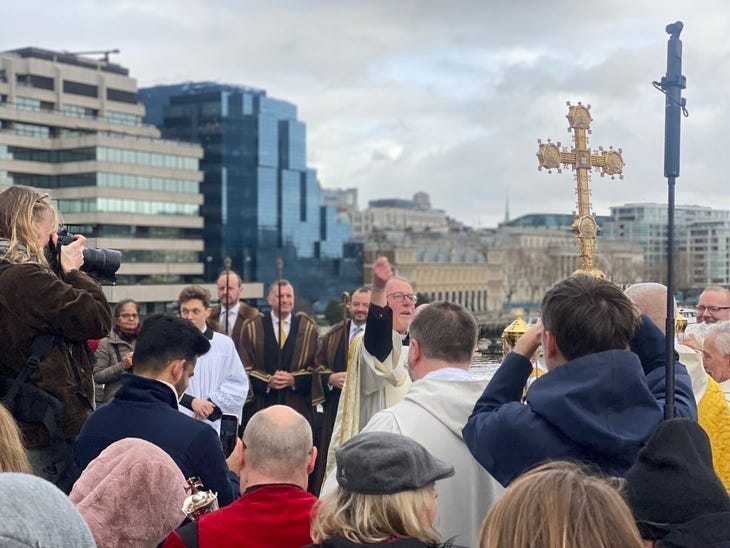 Members of the clergy and public gathered in the middle of London Bridge