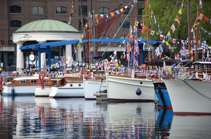 Classic boats covered in colourful bunting