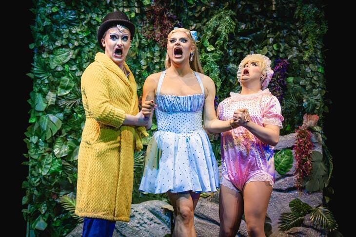 Three drag queens on stage