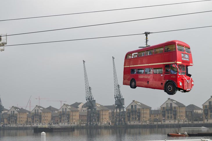 A routemaster bus dangling from a wire