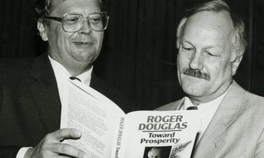 David Lange and Roger Douglas peruse a copy of Douglas’s book Towards Prosperity in 1987. (Photo: John Nicholson for Evening Post via National Library)   