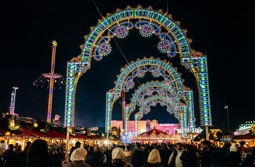 Illuminated colourful arches over Winter Wonderland