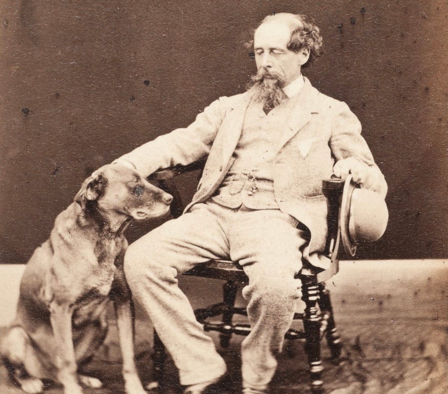 A photograph of Charles Dickens with a dog