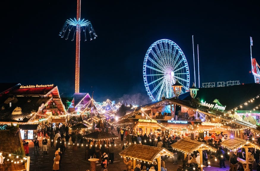 The funfair at Hyde Park Winter Wonderland, illuminated at night