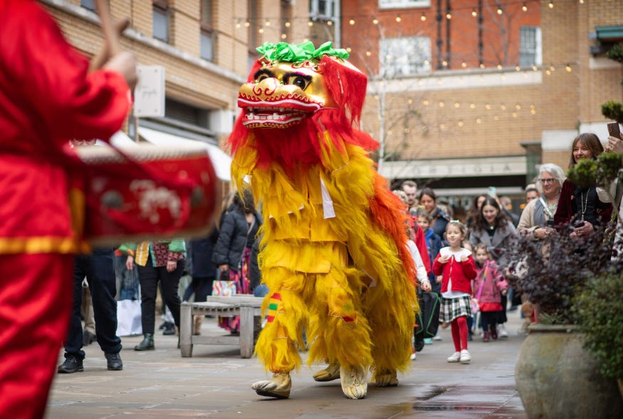 People watching a traditional lion dance