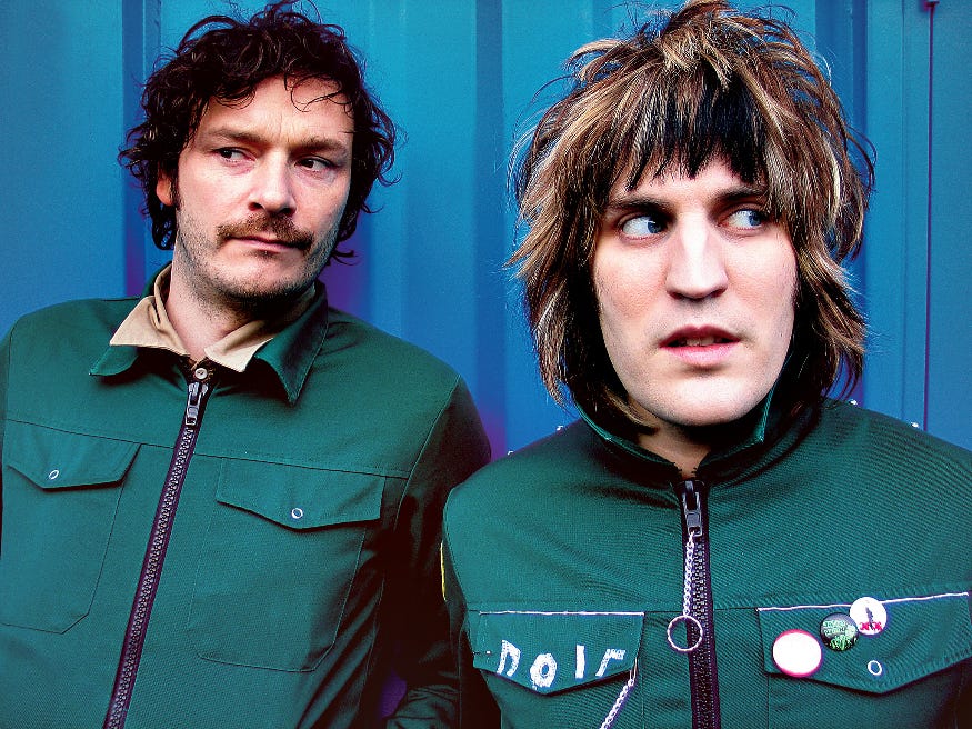 Michael Fielding and Noel Fielding in green boiler suit costumes for The Mighty Boosh