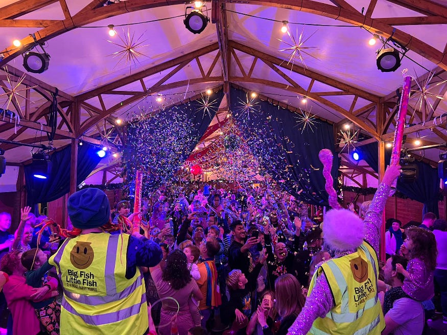 Families partying together, with confetti falling on them