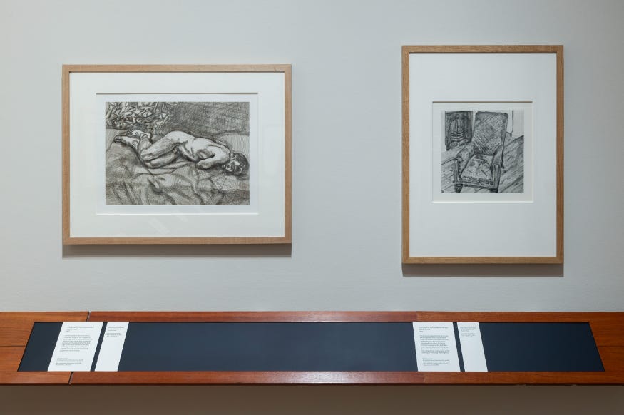 Two of Freud's drawings framed side by side in a gallery