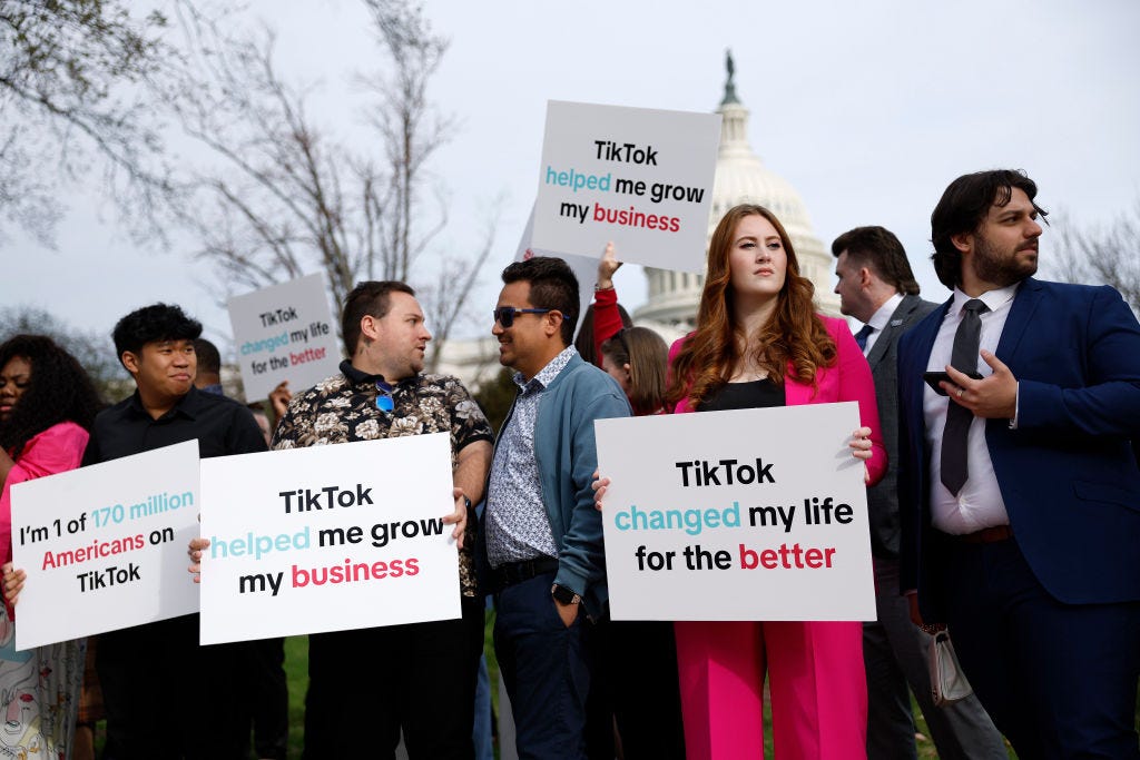 TikTok users rally in front of the U.S. Capitol.