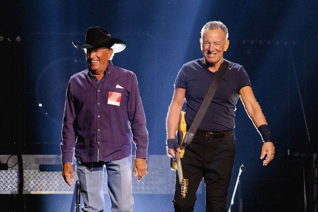 George Strait and Bruce Springsteen on stage