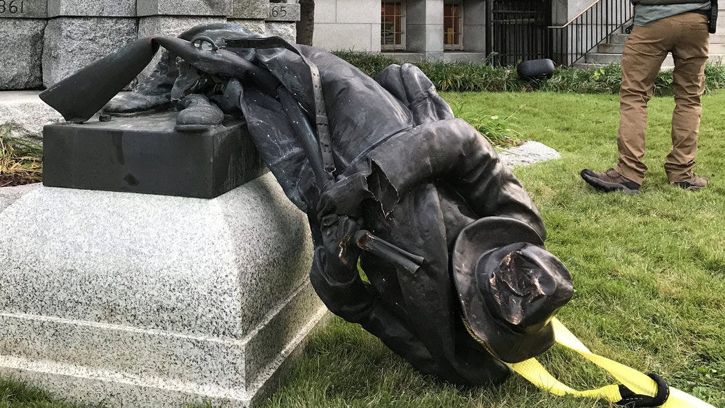 Protesters in Durham Topple a Confederate Monument - The New York Times