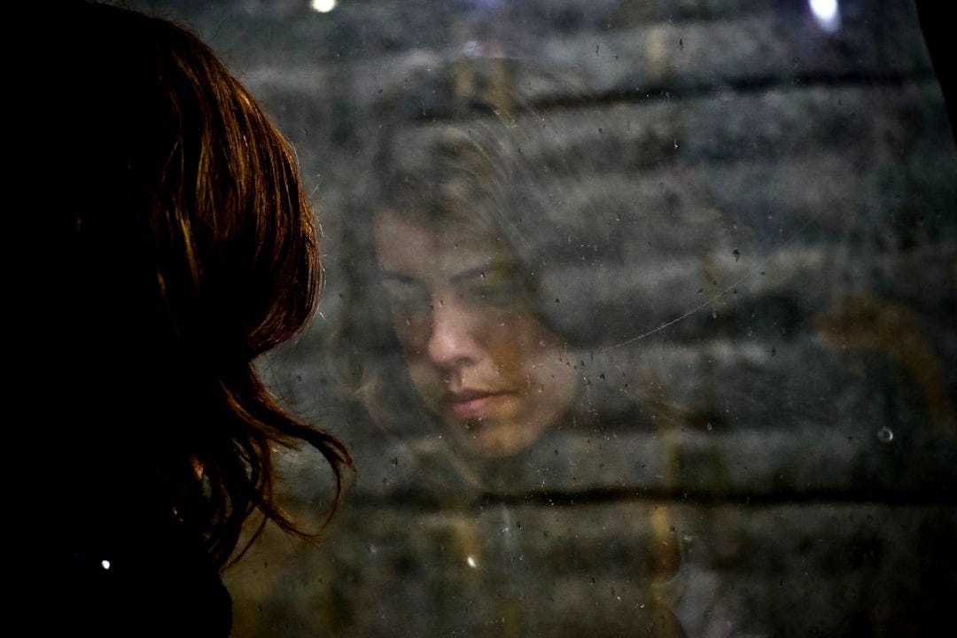 woman looking at the floor