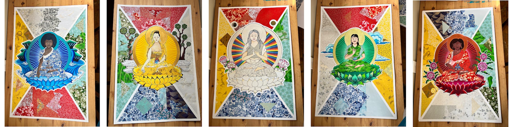 Left to right, photographs of five colourful mixed-media art pieces representing the Five Buddha Families in non-male embodiments. From left to right they are Akshobya (Vajra family), Ratnasambavha (Ratna family), Vairocana (Buddha family), Amoghasiddhi (Karma family) and Amitabha (Padma family) 