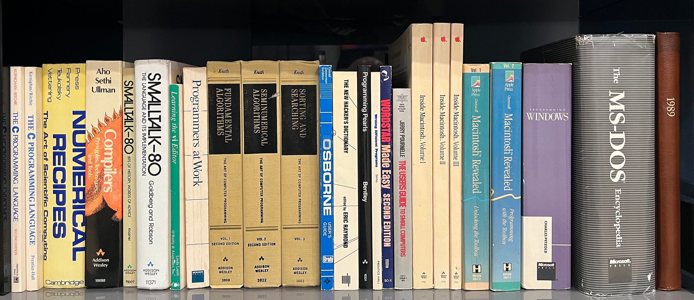 Some books from my shelf including: Numerical Recipes, Compilers: Princples, Techniques, and Tools, SmallTalk 80, Learning the vi Editor, the C++ Programming Language, Donald Knuth set, The Osborne User Guide, Macintosh Revealed volumes 1 and 2, Wordstar Made Easy, Undocumented Windows, Windows Programming by Petzold