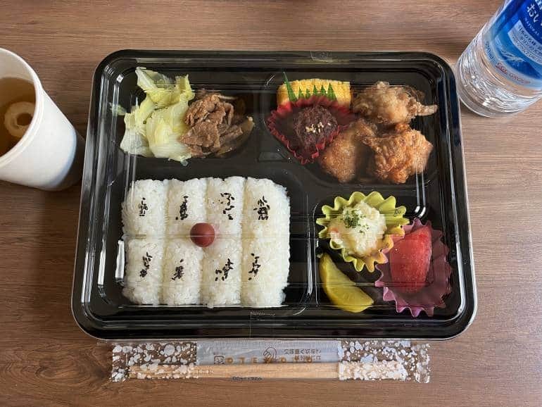 Bento box with rice, meat and pickles