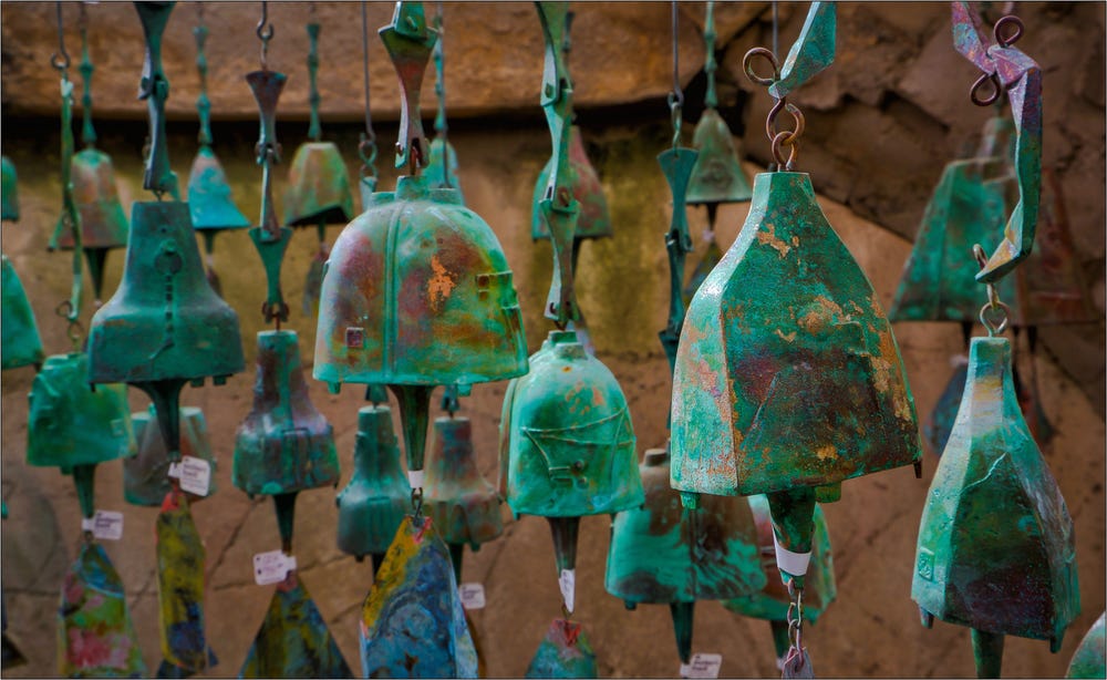 Brass bells manufactured at Arcosanti, beautifully aged with cupric oxide, of manifold unique constructions