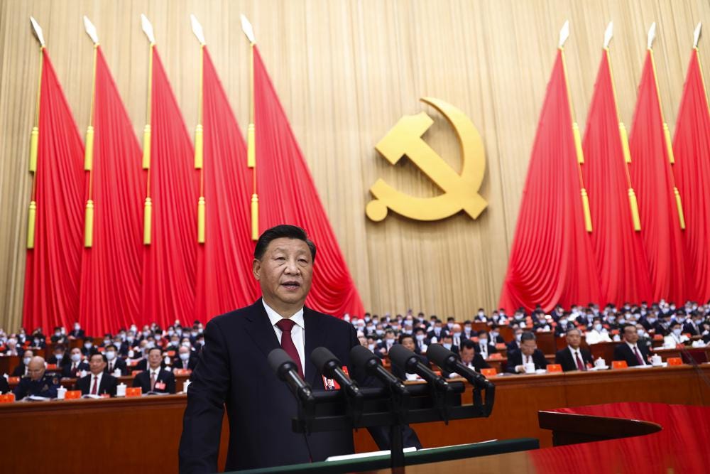 In this photo released by Xinhua News Agency, Chinese President Xi Jinping delivers a speech during the opening ceremony of the 20th National Congress of China's ruling Communist Party in Beijing, China, Sunday, Oct. 16, 2022. China on Sunday opens a twice-a-decade party conference at which leader Xi Jinping is expected to receive a third five-year term that breaks with recent precedent and establishes himself as arguably the most powerful Chinese politician since Mao Zedong. (Ju Peng/Xinhua via AP)