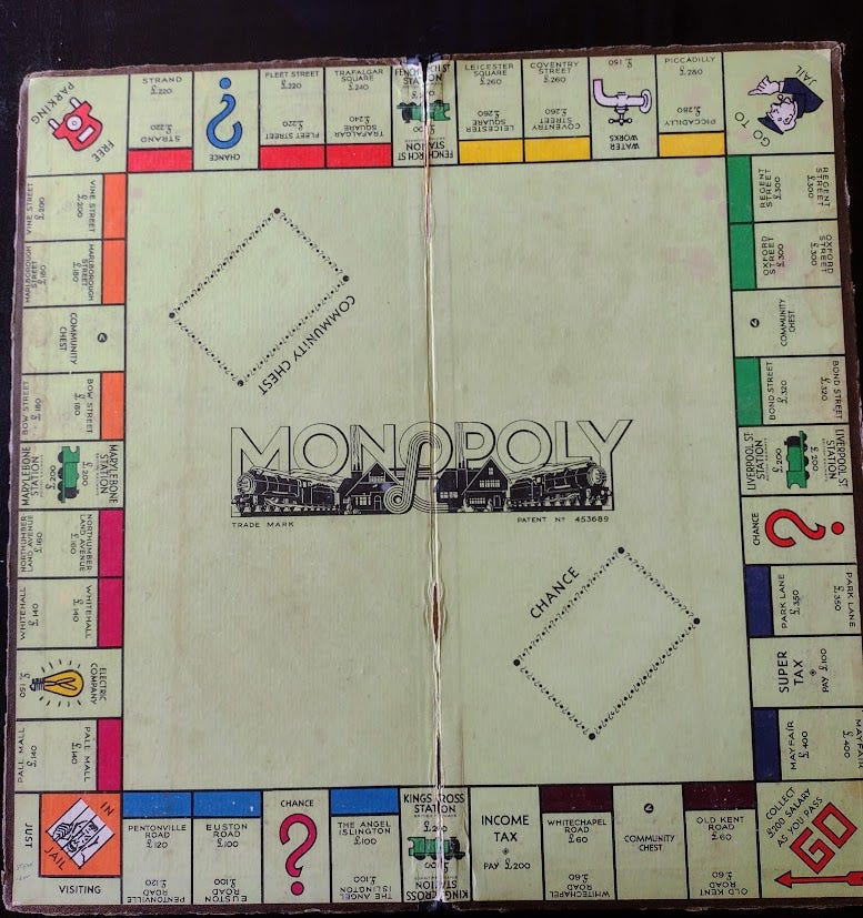 Monopoly board with London placenames and prices in pounds