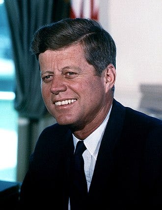 330px-John_F._Kennedy,_White_House_color_photo_portrait