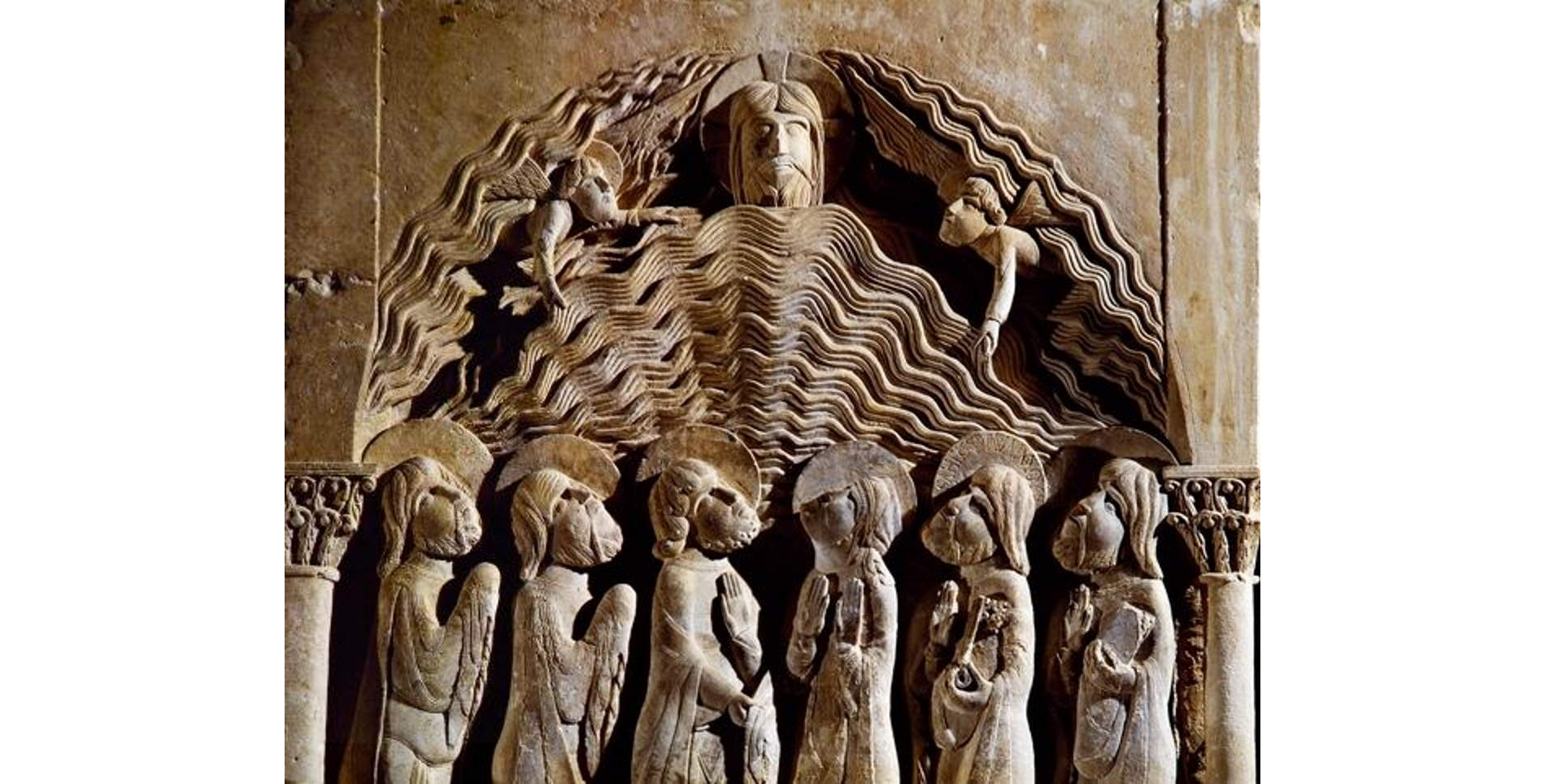 Romanesque relief of Christ ascending in clouds of glory
