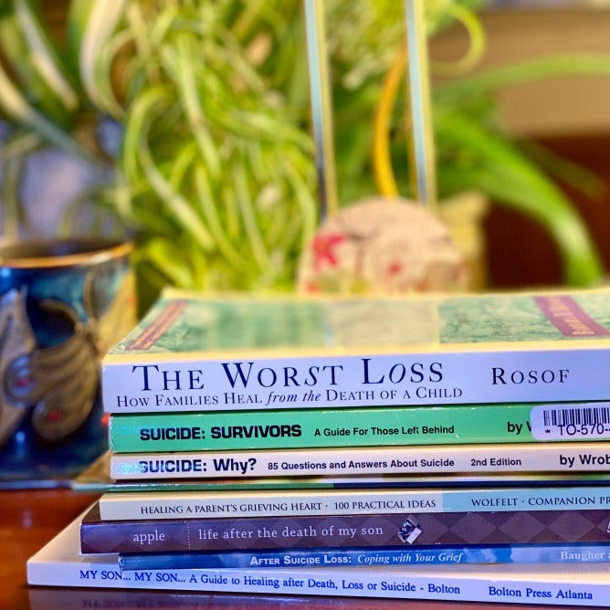 a stack of books about grief, hope, and healing after suicide loss, My Forever Son, Suicide is Not a Choice-Surviving Your Child's Suicide and Surviving Your Child's Suicide and Understanding Suicide: It's Not About Wanting to Die; It's About Wanting the Pain to Stop, also A Poem About Being Haunted by Guilt After Losing My Son to Suicide: Still From Sky I'm Falling; also books for loss survivors