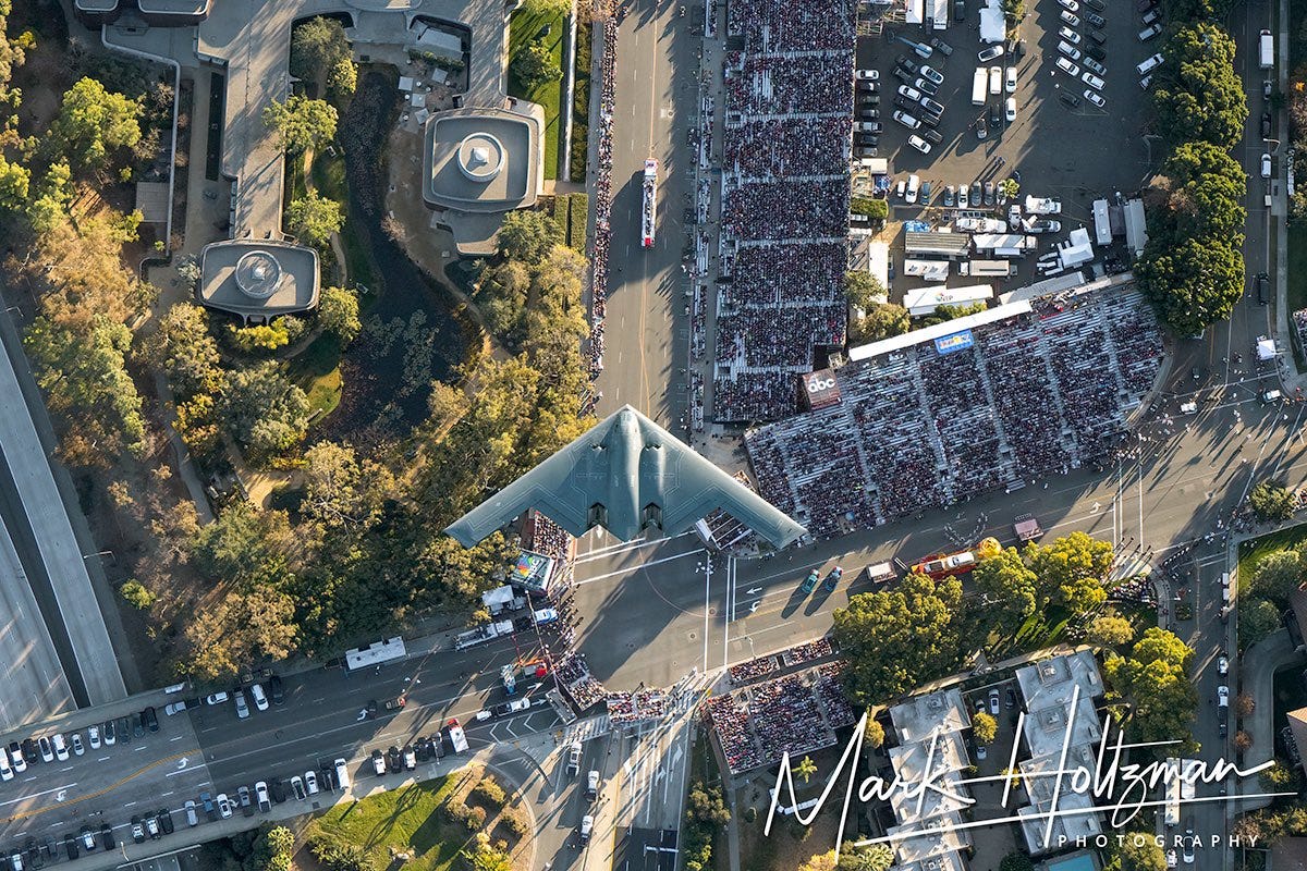 A B-2 Spirit stealth bomber flies over the 2025 Rose Parade in Pasadena California on New Year's Day.