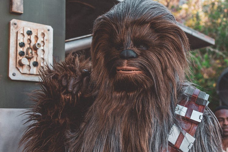 Chewbacca with his paw to his ear