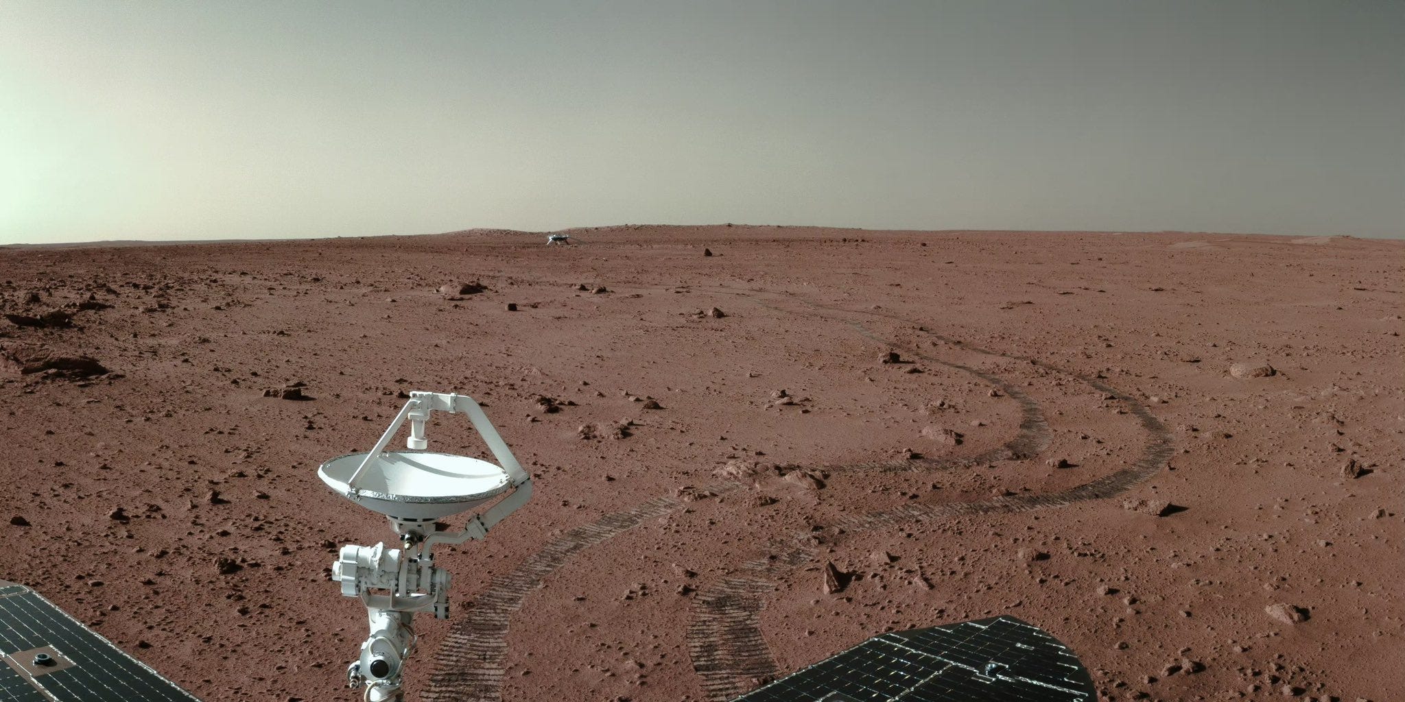 China’s Zhurong rover looking back on the Tianwen-1 lander on the surface of Mars in 2021.