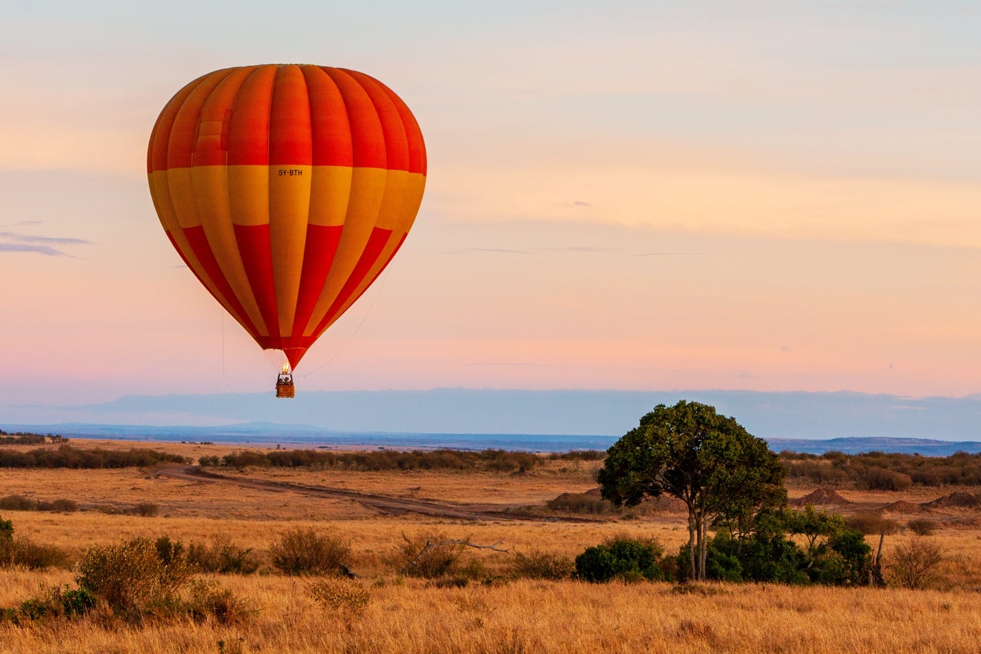 A hot air balloon in the sky

Description automatically generated