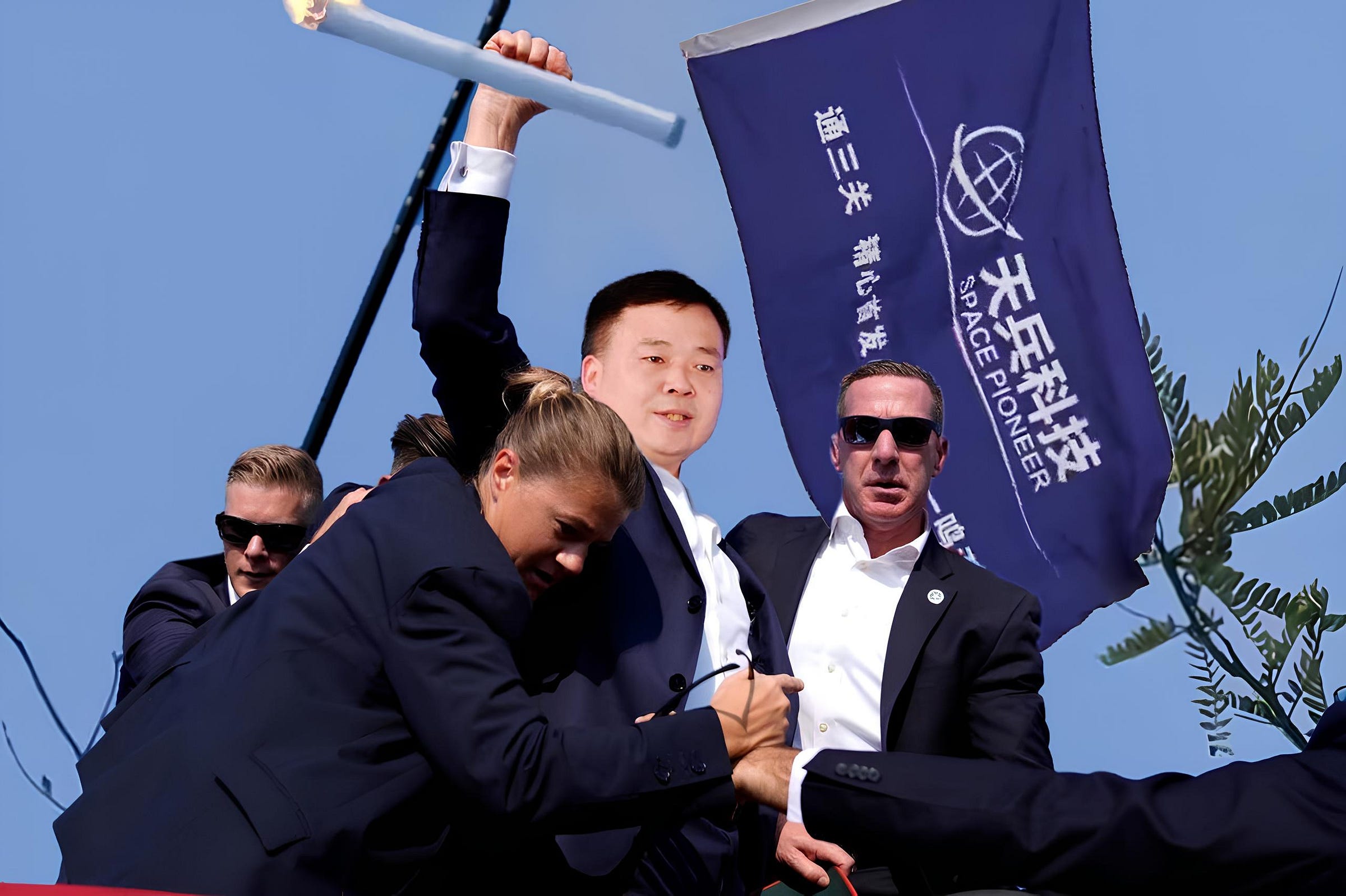 Space Pioneer’s Chairman, Kang Yonglai, holding Tianlong-3’s first-stage during its airborne static fire superimposed onto a photo of Donald Trump from July 2024. Space Pioneer’s Chairman, Kang Yonglai, holding Tianlong-3’s first-stage during its airborne static fire superimposed onto a photo of Donald Trump from July 2024.