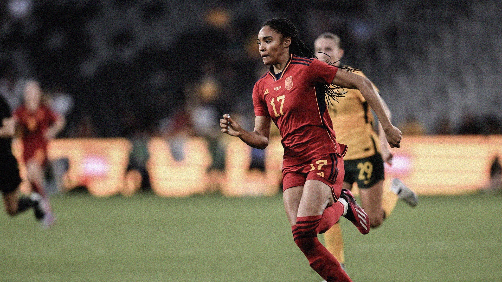 A photo of Salma Paralluelo chasing after the ball playing for Spain