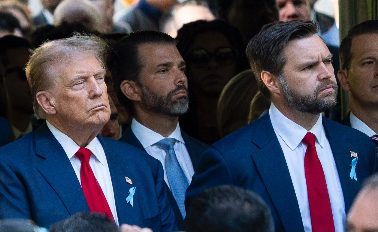 Donald Trump standing with JD Vance with Don Jr. in the background