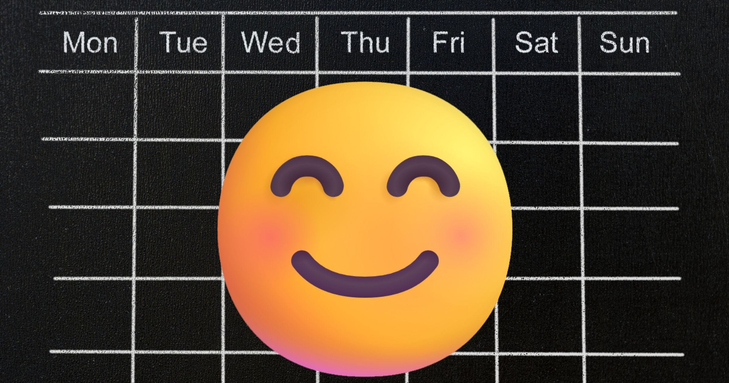 Smile emoticon on top of a calendar