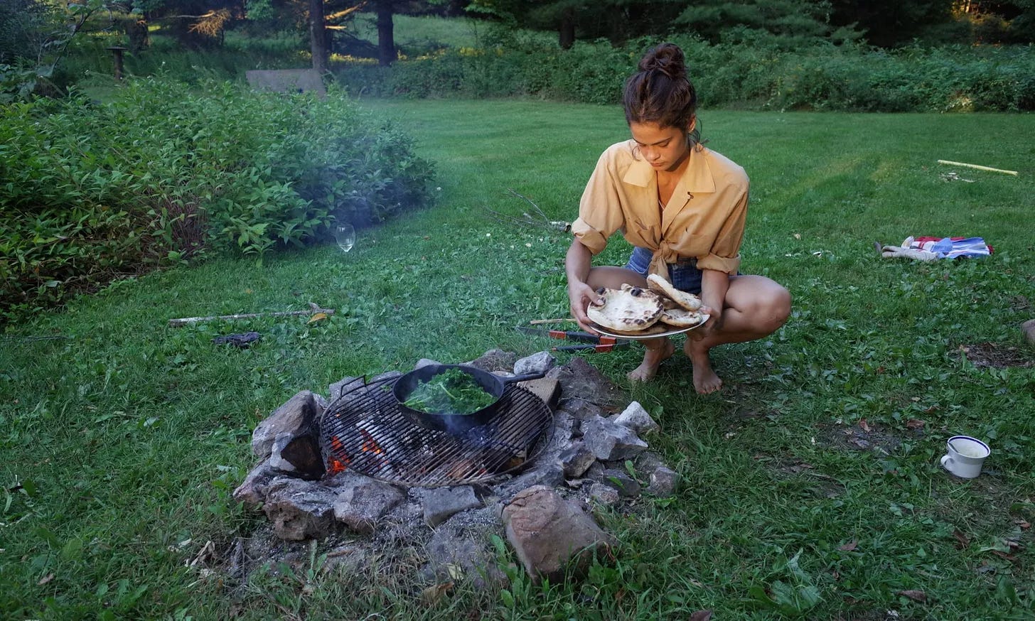 lexie smith baking flatbread at her farm in upstate new york