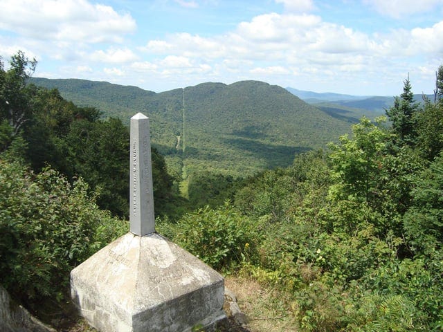 r/Borderporn - Border clearing and marker between USA (Vermont, left) and Canada (Quebec, right)