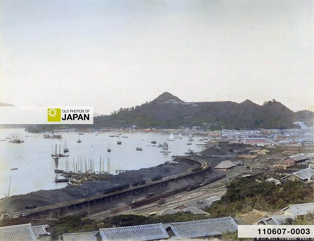 Mounds of coal at Moji Harbor, 1890s