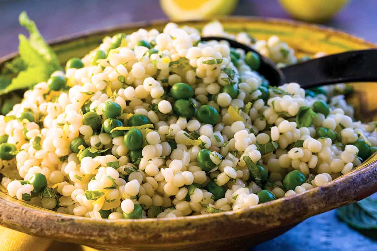 Israeli couscous in a pea salad