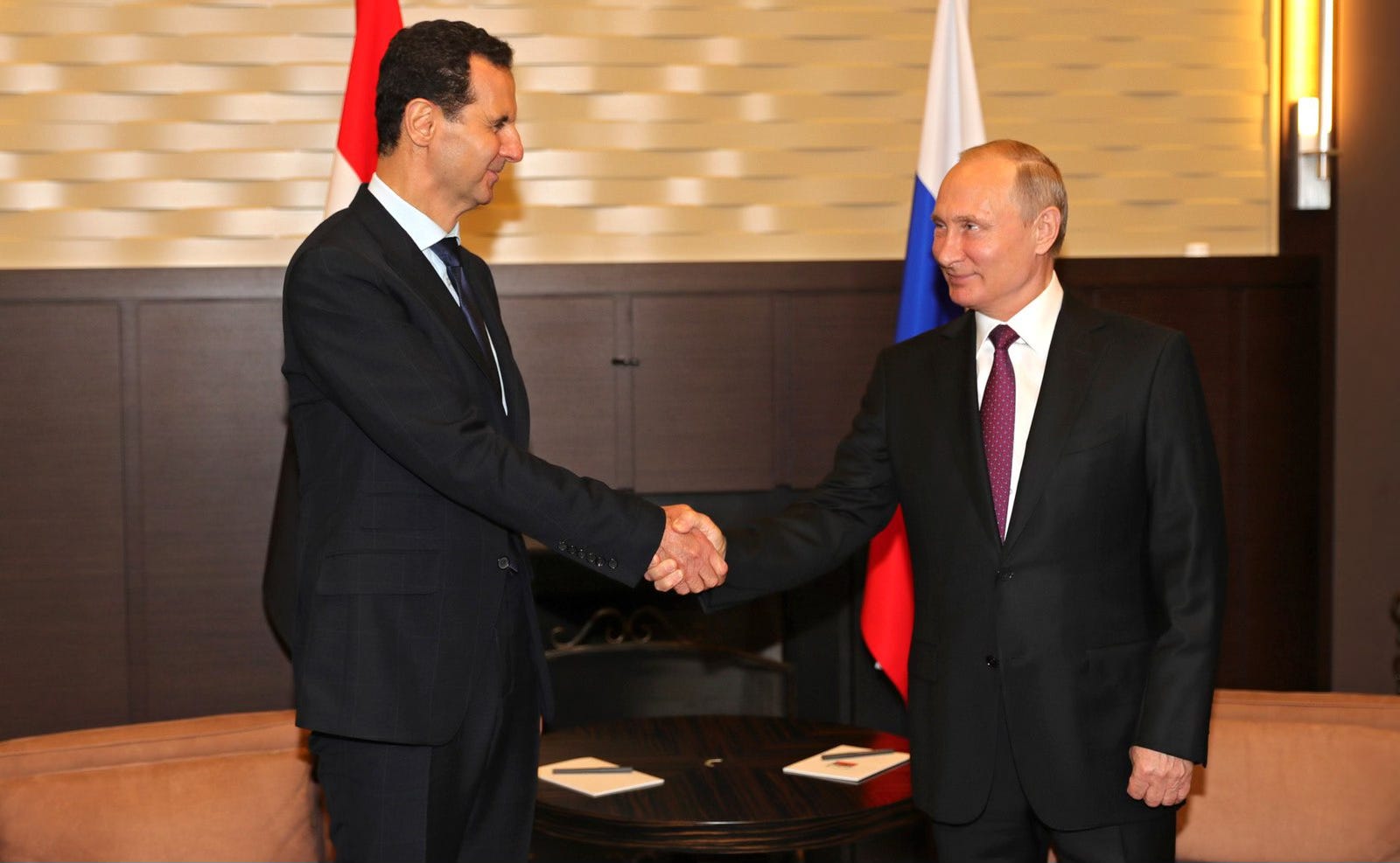 al-Assad and Putin