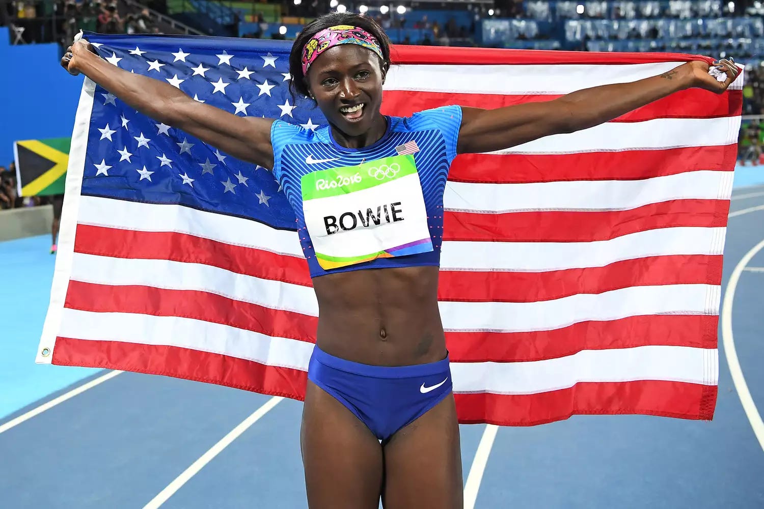 Silver medallist USA's Tori Bowie celebrates after the Women's 100m Final during the athletics event at the Rio 2016 Olympic Games at the Olympic Stadium in Rio de Janeiro on August 13, 2016.